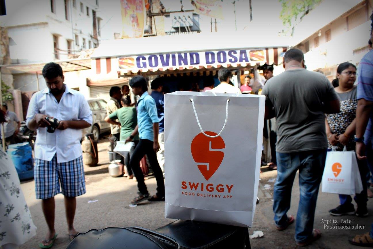 Логотип индийского сервиса доставки еды Swiggy