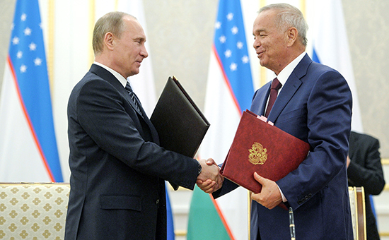 Президент РФ Владимир Путин и президент Узбекистана Ислам Каримов (слева направо). Архив