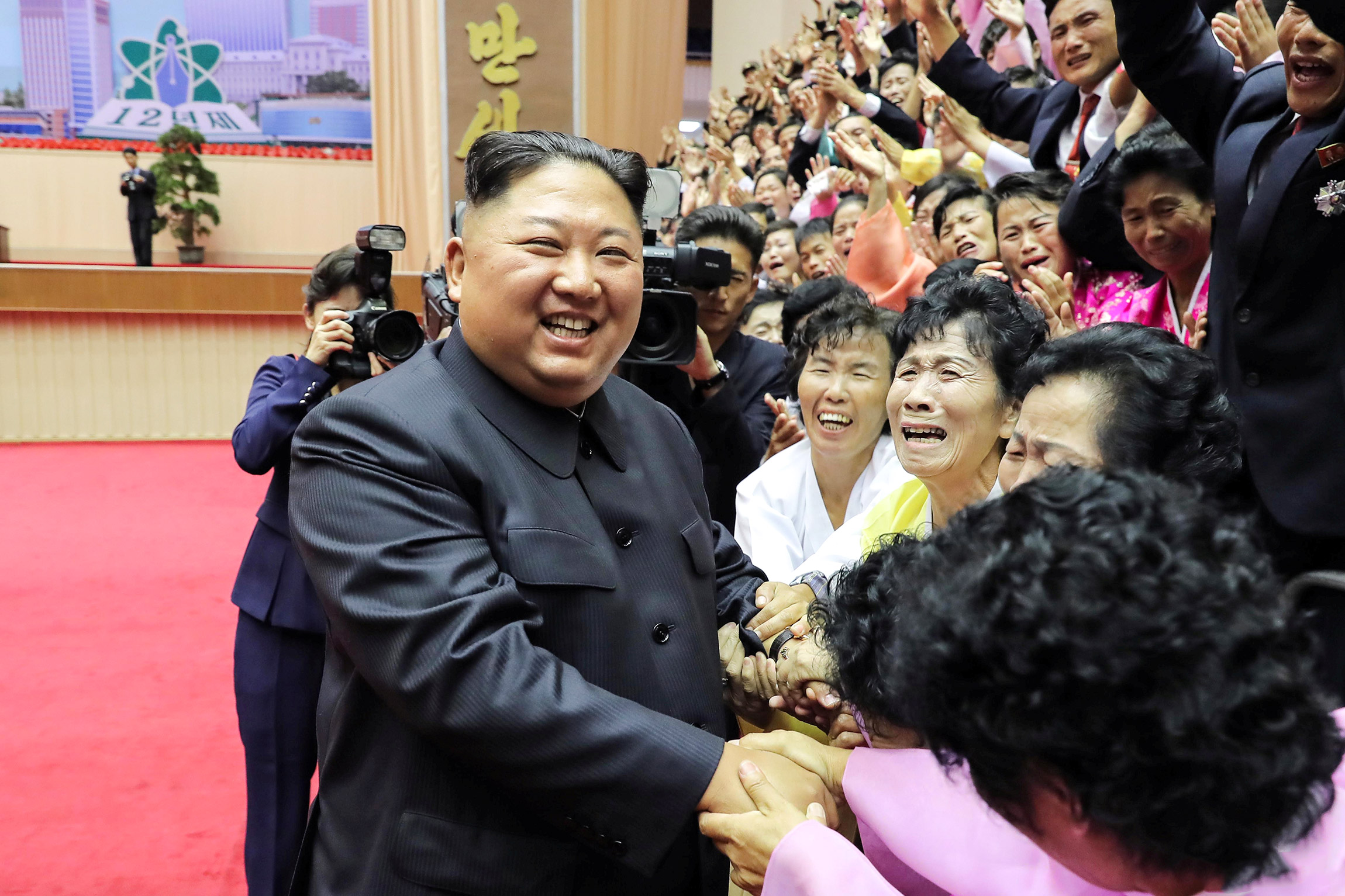 Председатель Государственного совета КНДР Ким Чен Ын во время Национальной конференции учителей, 7 сентября 2019 года. Пхеньян, КНДР​
