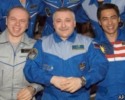 Российско-малайзийский экипаж МКС вернулся на Землю