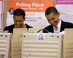 Б.Обама проголосовал вместе с семьей