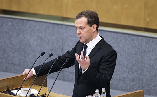 Премьер-министр РФ Дмитрий Медведев во время выступления с отчетом о результатах деятельности правительства РФ за 2014 год