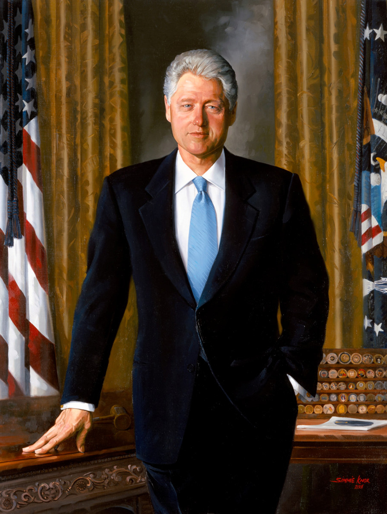 Билл Клинтон, 2002 год. Художник&nbsp;&mdash; Симми Нокс

Это первый портрет президента США, выполненный афроамериканцем.