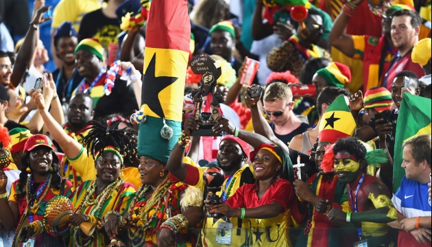Фанаты сборной Ганы  во время матча в Группе G Гана - США. 