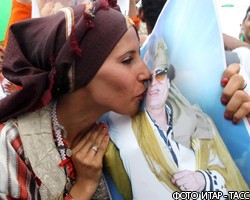 М.Каддафи просит о помощи, но останется на посту до конца