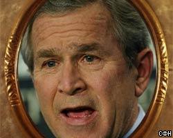В камере С.Хусейна повесили портрет Дж.Буша