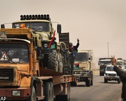 Войска М.Каддафи продвигаются к центру Адждабии