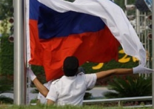 В олимпийском Пекине поднят российский флаг