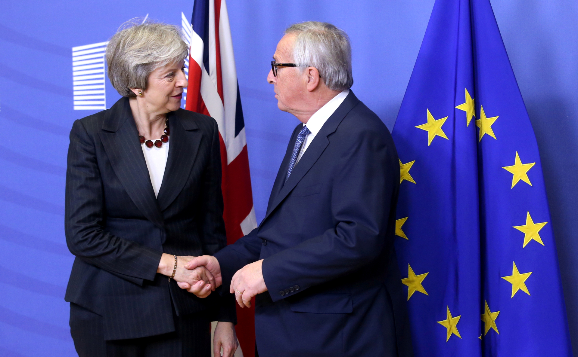 Премьер-министр Британии Тереза Мэй и президент Еврокомиссии Жан-Клод Юнкер