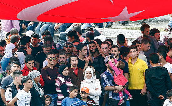 Мигранты из Сирии на автобусном вокзале в Стамбуле


