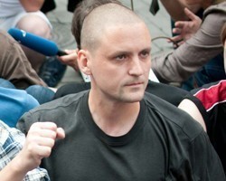 Удальцов заплатит за избиение прокремлевской активистки