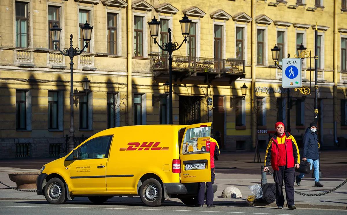 DHL прекратит доставку грузов по России — РБК