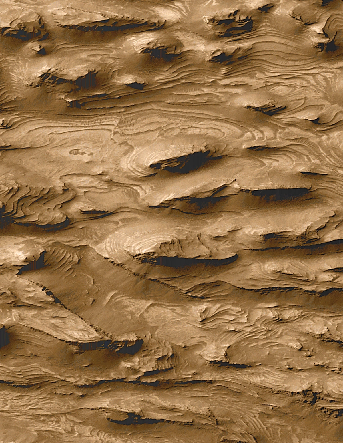 Этот снимок поверхности Марса, полученный в 2000 году орбитальным аппаратом Mars Global Surveyor , дал исследователям основания полагать, что планета могла быть покрыта водой в ранний период своего существования. Позднее эти основания <a href="https://dx.doi.org/10.1126/sciadv.abn8555">подтвердились</a>