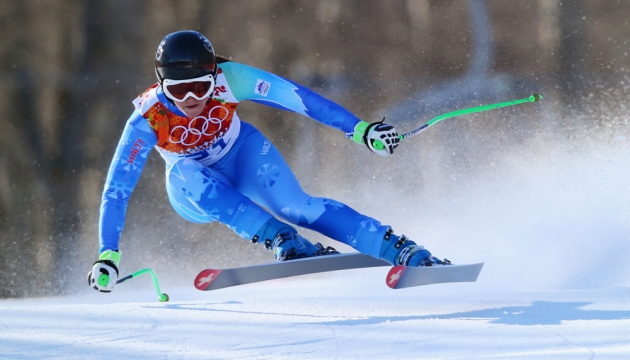 Tina Maze из Словении во время скоростного спуска на  лыжах в горнолыжном центре «Роза Хутор»