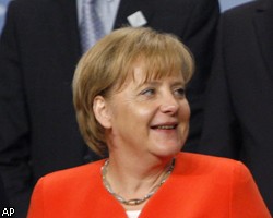 А.Меркель посочувствовала Д.Кэмерону из-за ошибки футбольного судьи