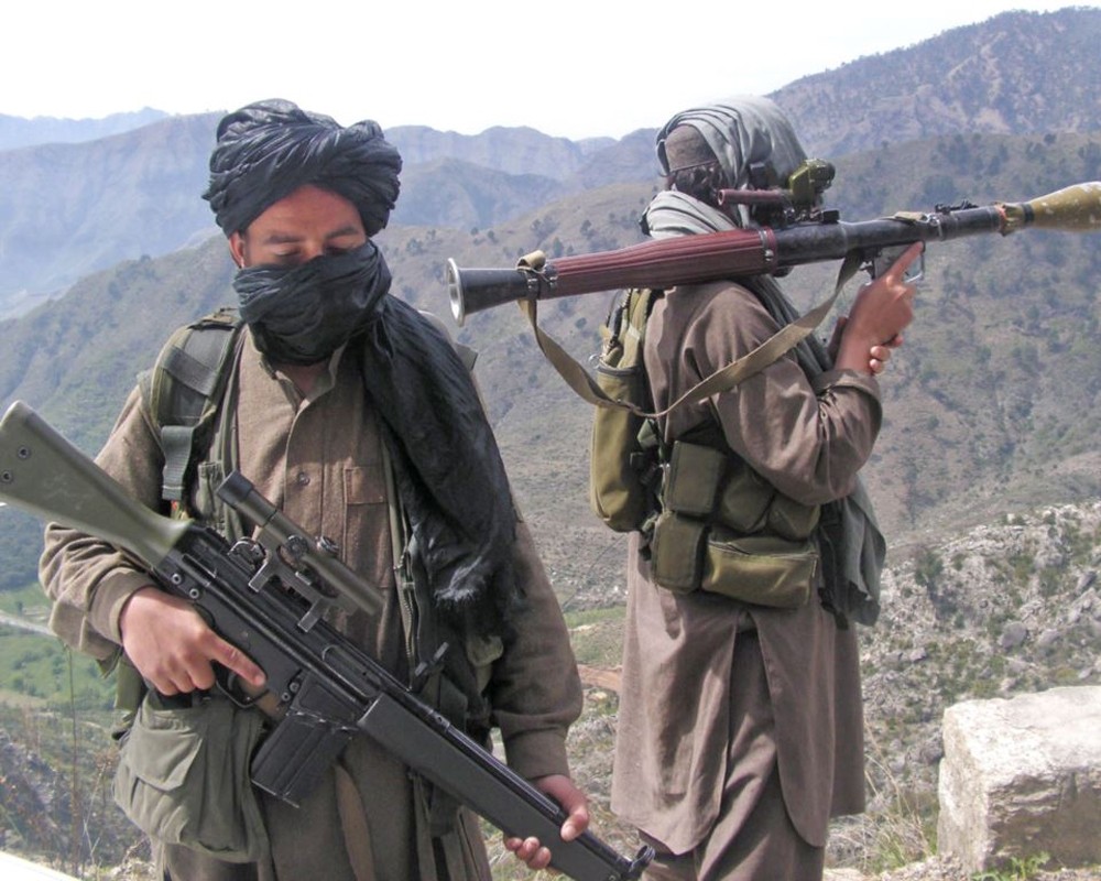 Фото талиба с оружием