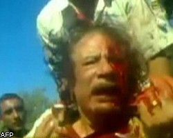 Убийцы М.Каддафи могут быть причастны к массовым казням в Ливии
