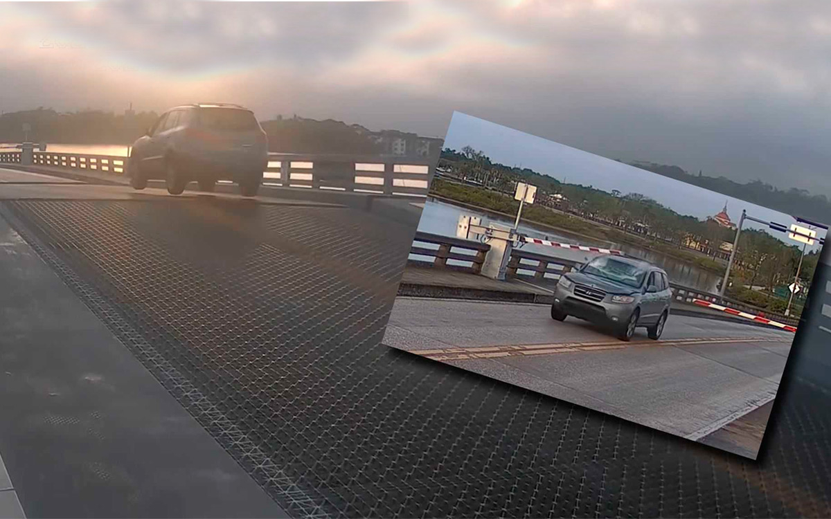 Hyundai Santa Fe снес шлагбаумы и перепрыгнул разводной мост. Видео