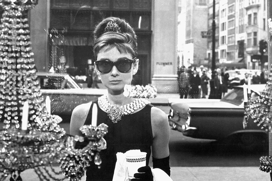 Специально для Хепберн дизайнер создал знаменитое черное платье, ставшее эталоном классического вечернего платья. В нем актриса снималась в фильме &laquo;Завтрак у Тиффани&raquo;. В 2006 году платье было продано на аукционе Christie&#39;s почти за $1 млн.
