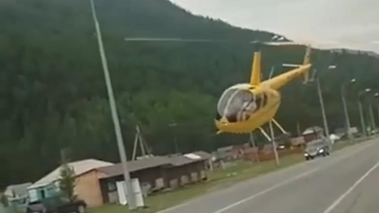 На Алтае вертолет заправился на заправке и пролетел в метре от ЛЭП. Видео