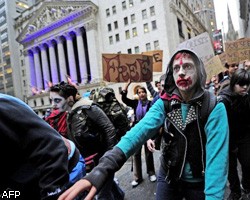 Протесты, начавшиеся на Уолл-стрит, распространяются по США