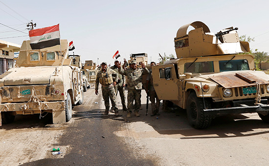 Иракские военные в центре&nbsp;Эль-Фаллуджи


