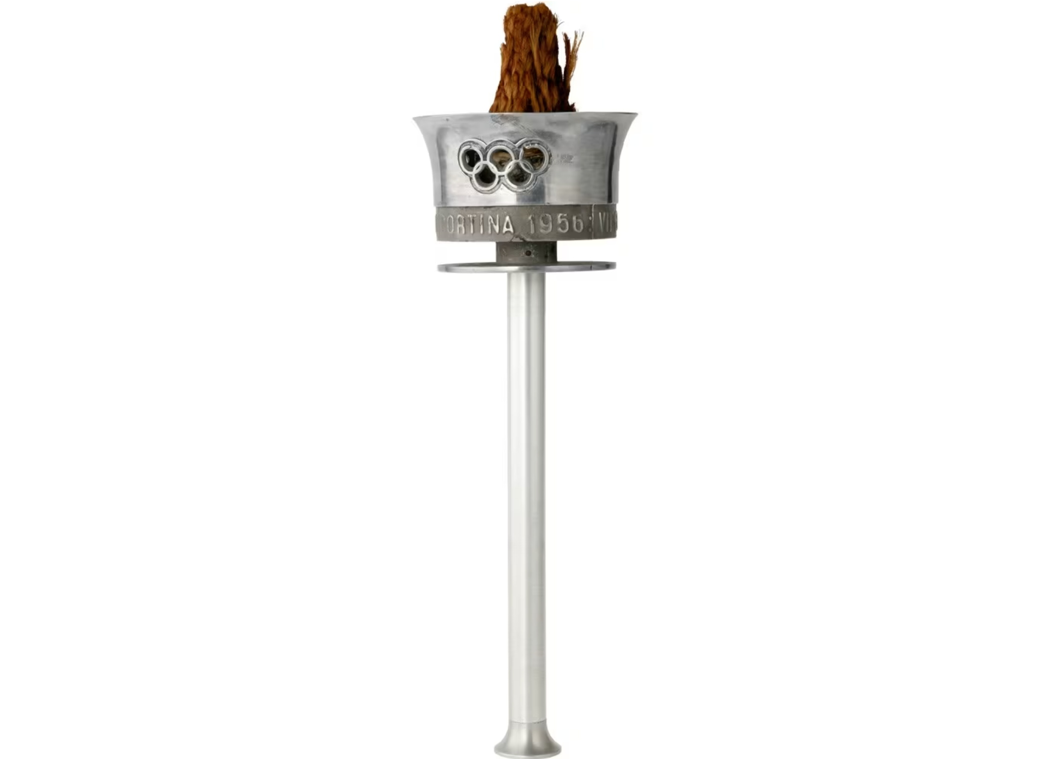 Факел для зимних Игр в итальянском городе Кортина-Д&rsquo;Ампеццо в 1956 году