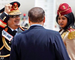 СМИ: С.Берлускони помогал М.Каддафи девушками