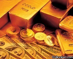 Цена золота на COMEX установилась ниже 1050 долл./унция