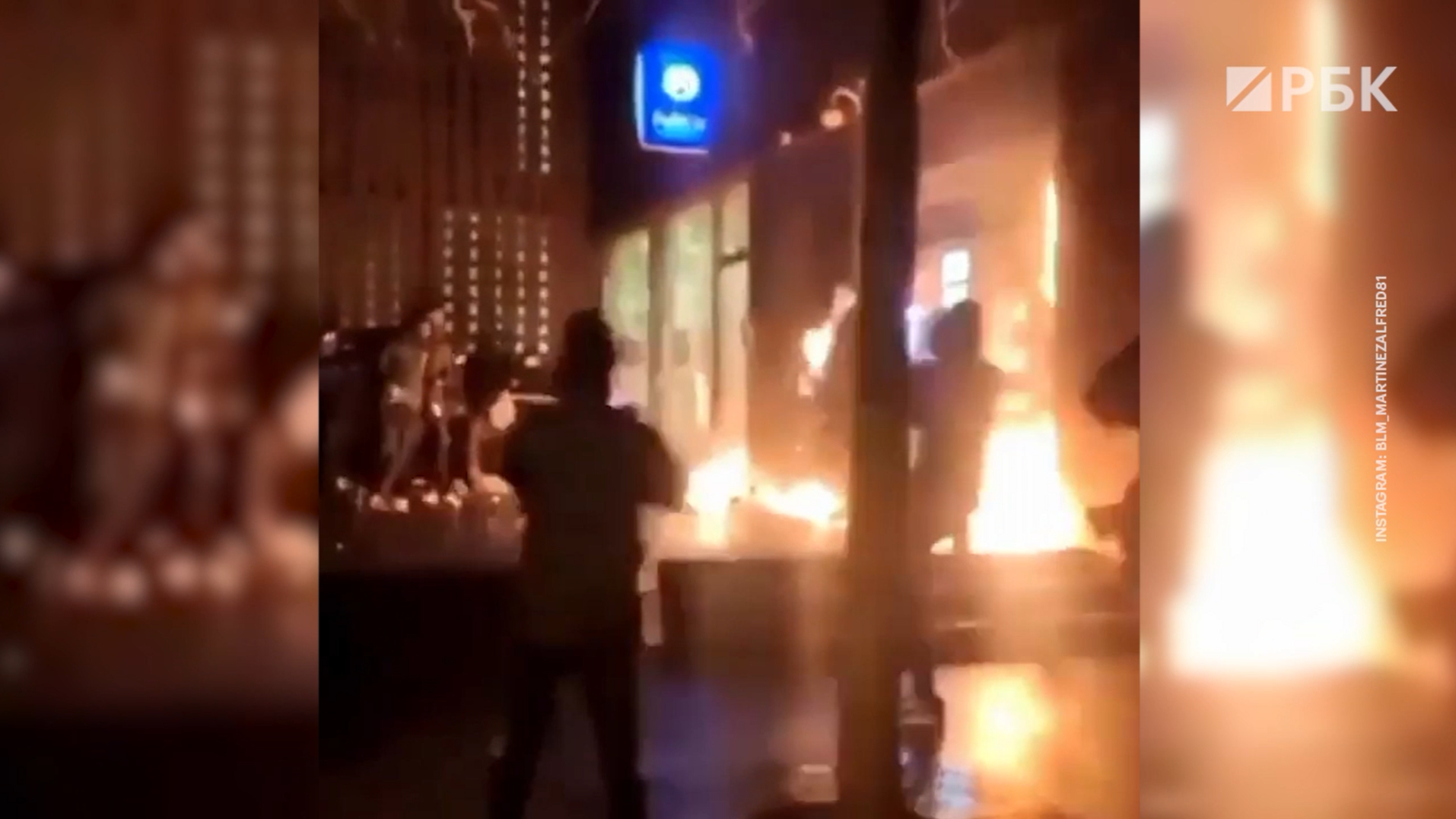 Как протестующие мигранты сожгли в Брюсселе полицейский участок. Видео