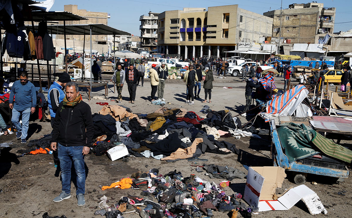 Место взрыва на центральном рынке в Багдаде