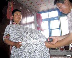 Китаянка притворялась беременной пятерней ради больного мужа 