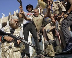 Сторонники убитого экс-лидера Ливии М.Каддафи захватили Бени-Валид