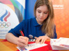 Юлия Липницкая во время автограф-сессии на праздновании Дня зимних видов спорта