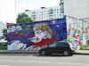 Известные художники разукрасили граффити стены 150 домов в Москве