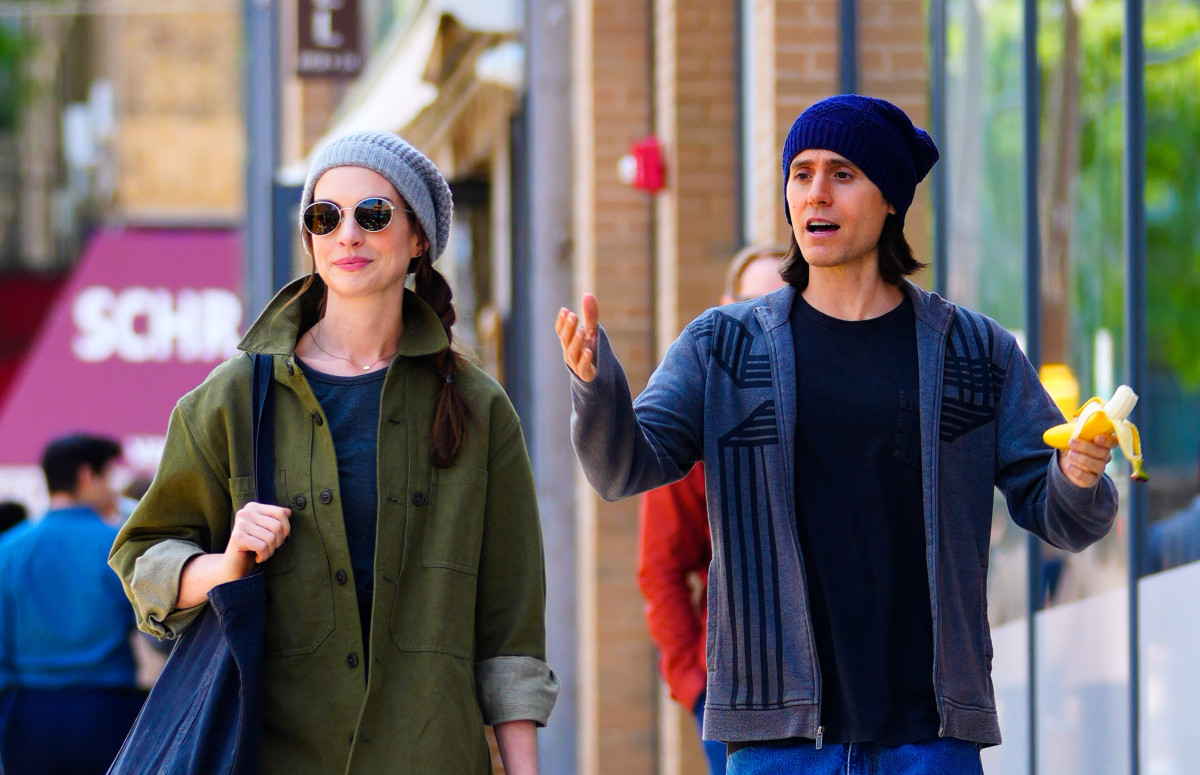 Anne Hathaway and Jared Leto on location for "WeCrashed" on May 25, 2021 in New York City