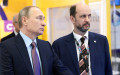 Президент России Владимир Путин и Герман Клименко (слева направо) на первом российском форуме «Интернет-экономика»,  22 декабря 2015 года


