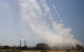 Израильская система противоракетной обороны «Железный купол» в действии против ракеты, выпущенной из сектора Газа, в городе Ашкелон, Израиль