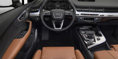 Новая Audi Q7 получила гибридную версию . Фотослайдер 0