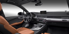 Новая Audi Q7 получила гибридную версию . Фотослайдер 0