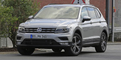 Дизайн удлиненного Volkswagen Tiguan рассекретили до премьеры. Фотослайдер 0