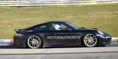 Обновленный Porsche 911 засняли во время тестов. Фотослайдер 0