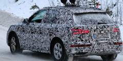 Audi вывела на зимние тесты новый Q5. Фотослайдер 0