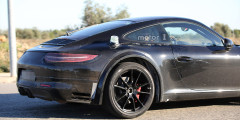 Компания Porsche приступила к дорожным испытаниям нового 911 . Фотослайдер 0