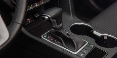 Базовые ценности. Тест-драйв Toyota RAV4 и Kia Sportage - Киа Салон