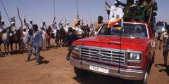 В 1989 году аль-Башир возглавил военный переворот и стал фактическим правителем Судана, заняв одновременно посты руководителя Совета командования революции национального спасения, главы кабмина, министра обороны и главнокомандующего. После его прихода к власти официальной религией в стране стал ислам, были введены законы шариата, запрещены политические партии
