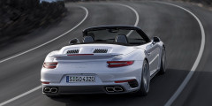 Компания Porsche представила обновленную версию 911 Turbo. Фотослайдер 0