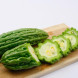 Незрелые плоды момордики харанции зеленые и по вкусу похожи на кабачки