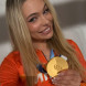 Ютта Лердам с золотой олимпийской медалью