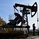 Рецессия и доллар по ₽110. Как падение цен на нефть угрожает России